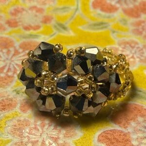 Elegant Gold and Black Beaded Ring